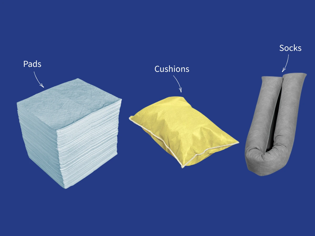 Stack of absorbent pads, an absorbent pillow and an absorbent boom